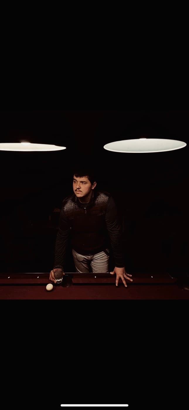 a crowd of people have their phones in their hands with the flashlight on and sing