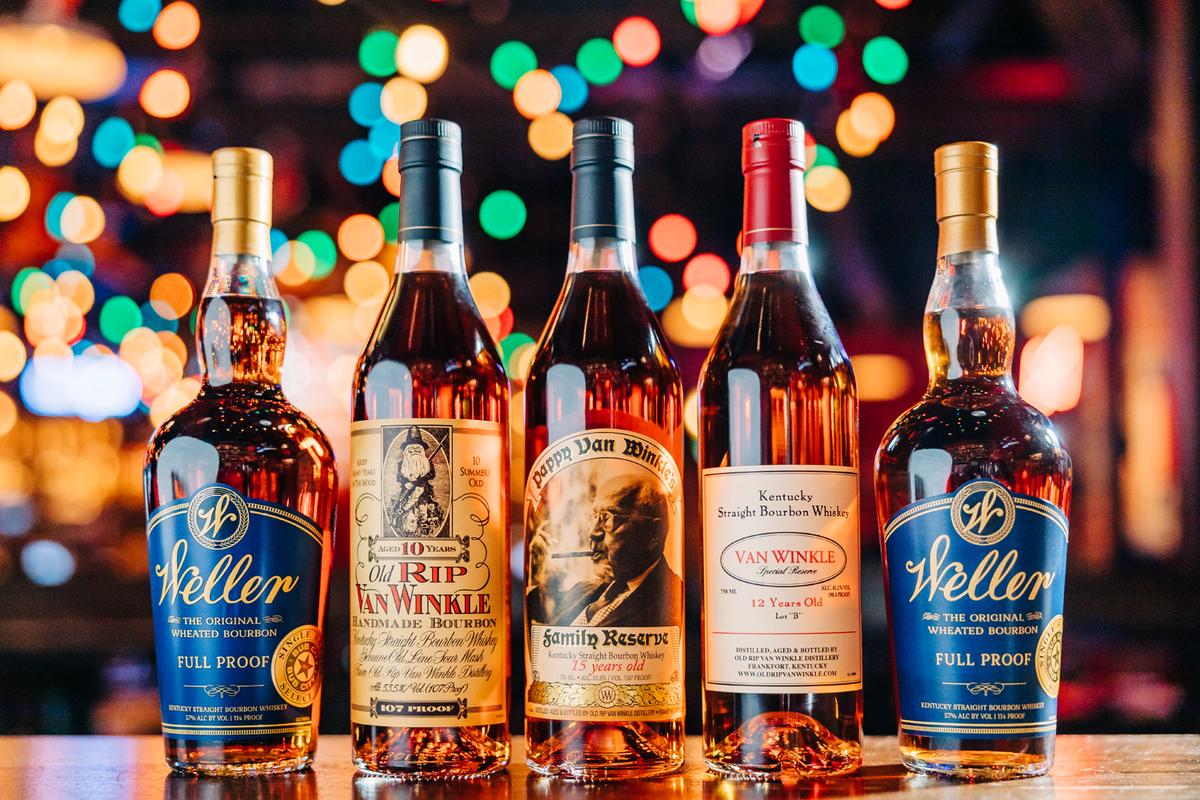 fives bottles of weller and pappy van winkle whiskey
