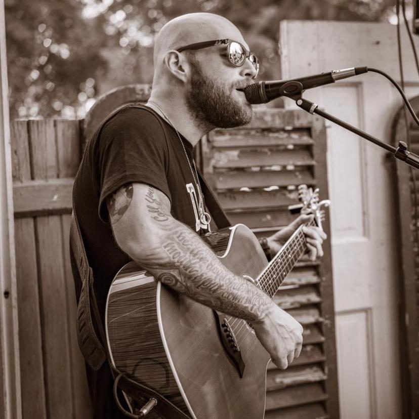 a crowd of people have their phones in their hands with the flashlight on and sing