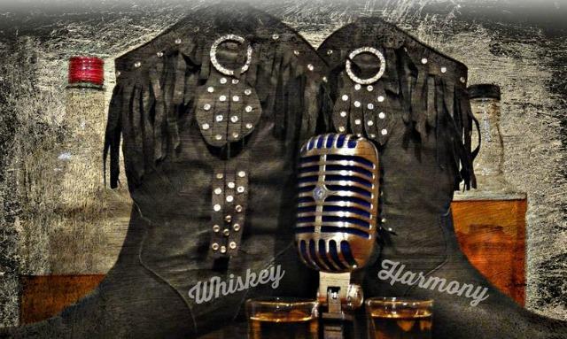 a crowd of people have their phones in their hands with the flashlight on and sing