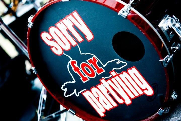 a crowd of people have their phones in their hands with the flashlight on and sing